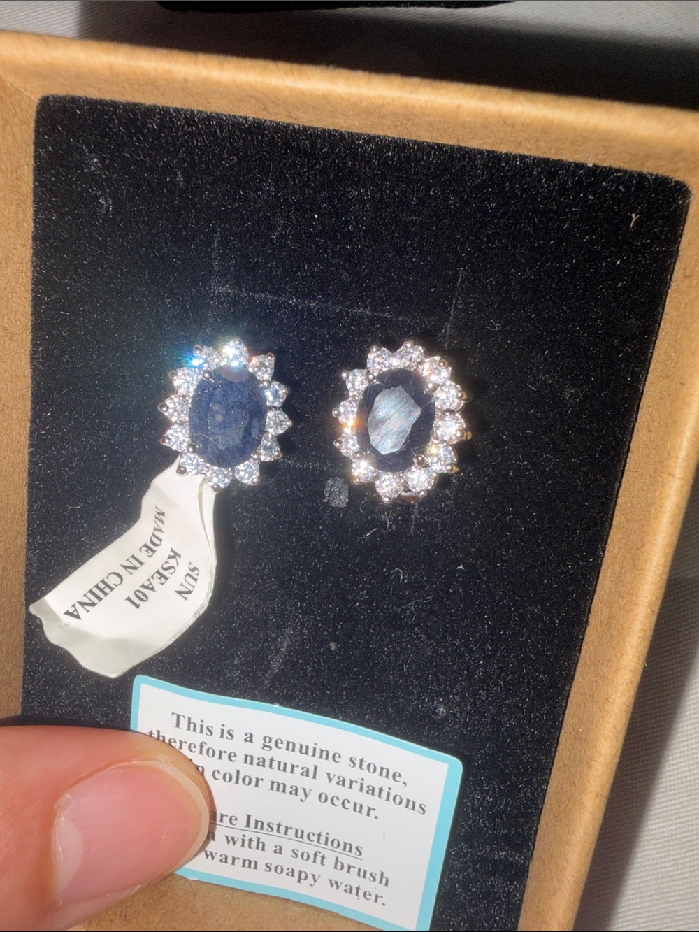 Genuine Blue Sapphire and lab diamonds on sides Stud Earrings